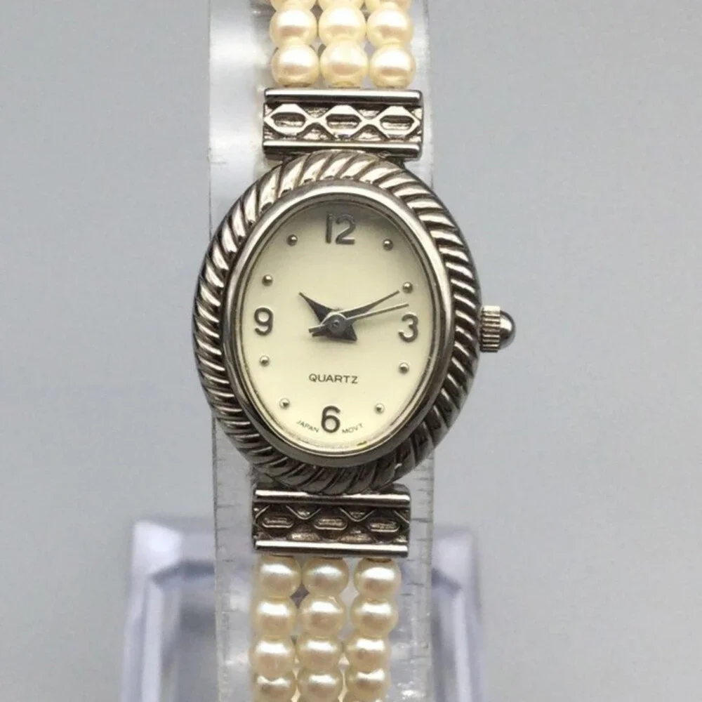 Avon Womens Watch 18mm Cream Oval Dial Faux Pearl Bracelet New Battery